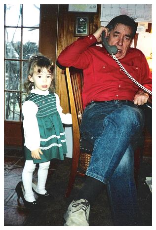 1990.. granddaughter Katie, in high heels, and Rob.jpg